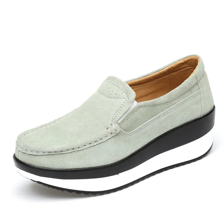 Women's high-comfort orthopedic suede slip-on loafers in a light tan color, casual flat shoes