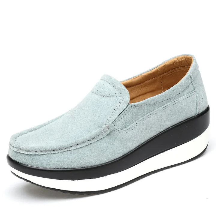 Elegant women's purple suede slip-on loafers, combining comfort with a stylish casual design