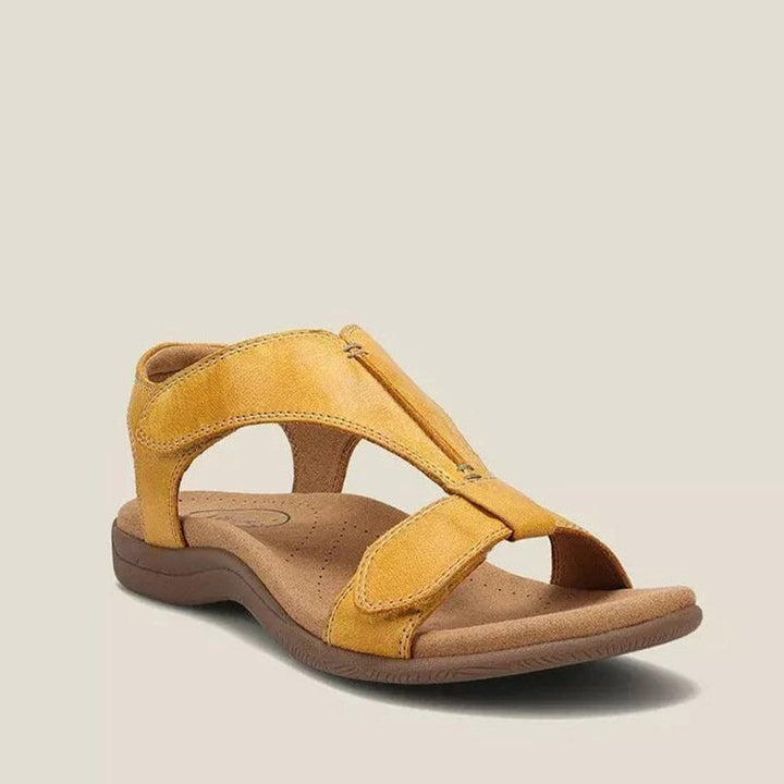 Casual women's flat sandals featuring an adjustable strap and open toe design for summer.
