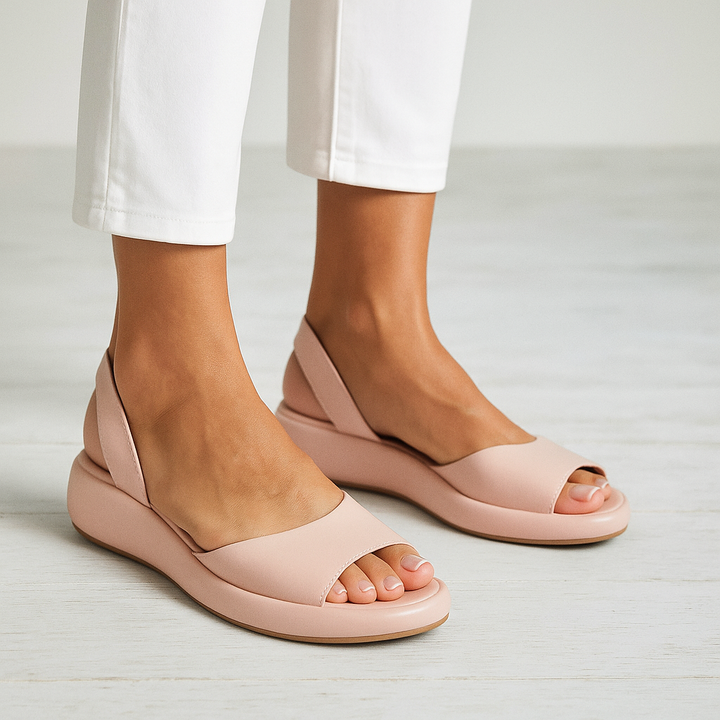 Women's comfortable open-toe slingback flat sandals for casual summer style and daily wear.