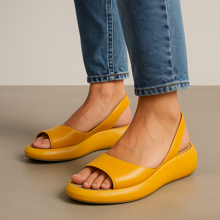 Women's fashionable open-toe slingback flat sandals with soft sole for all-day comfort.