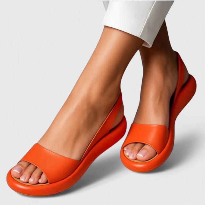 Stylish women's slip-on sandals, ideal for summer comfort & arch support.