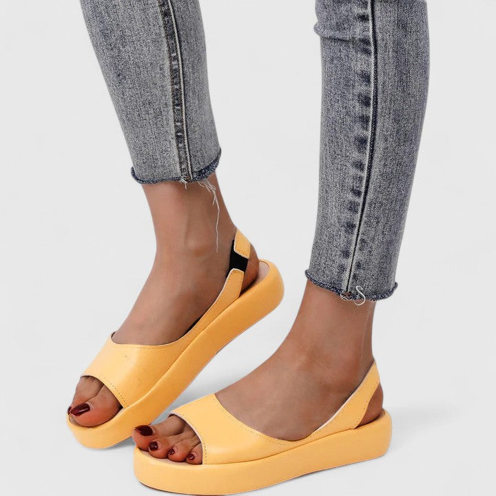 Orthopedic arch support sandals for women, providing comfortable foot pain relief.