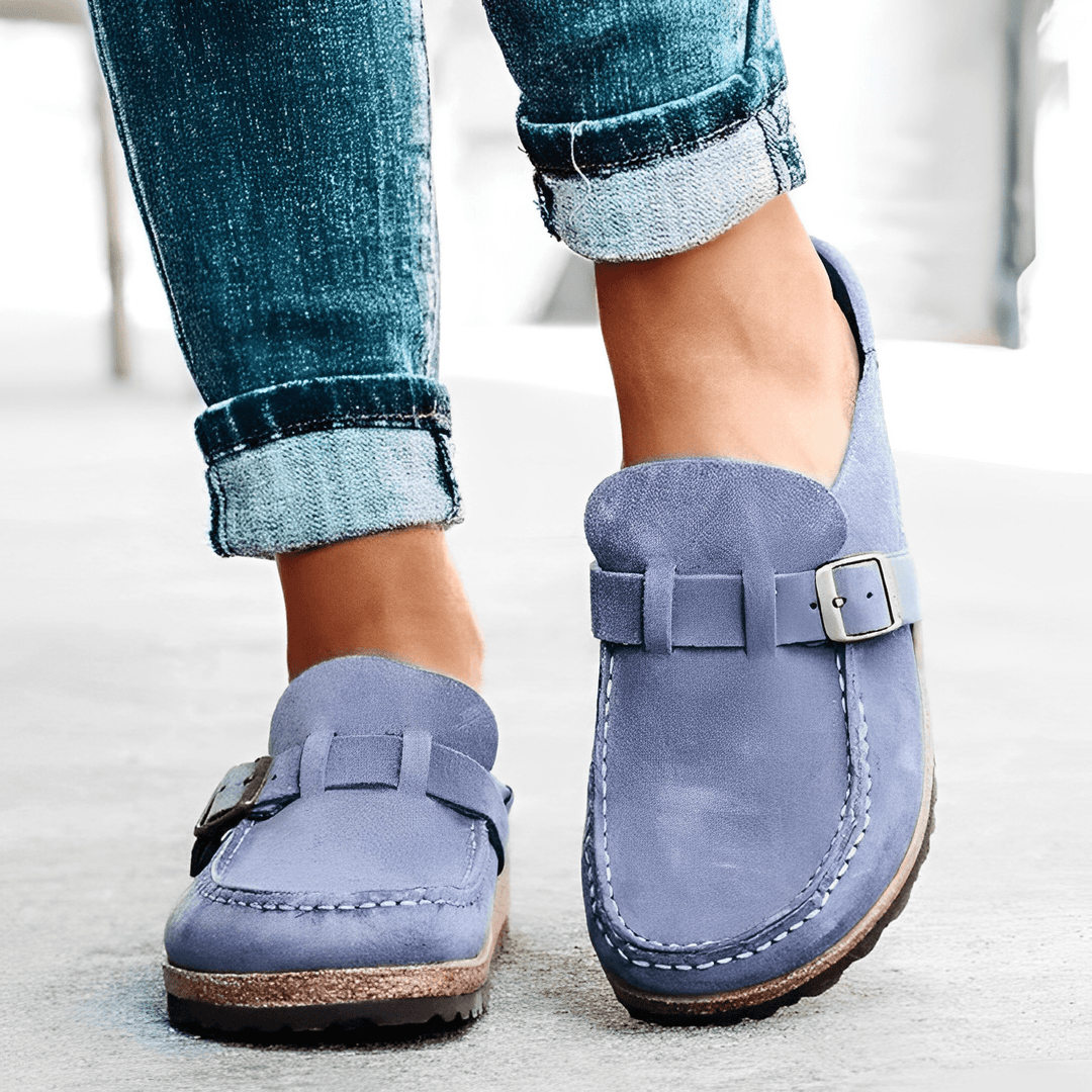 Front view of women's comfortable orthopedic mules, featuring a wide toe box for all-day support.