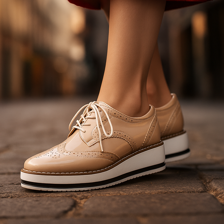 Close-up of the perforated detail on women's platform oxfords, showcasing breathability and style.