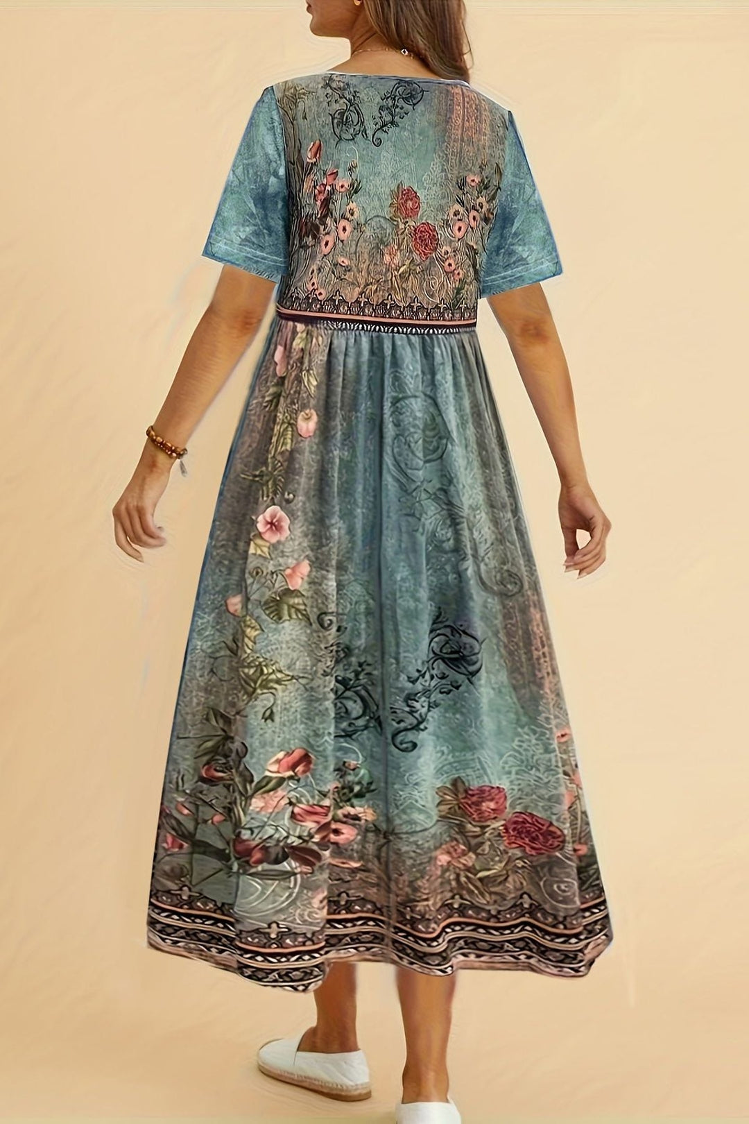 Comfortable women's versatile midi dress. Printed, knee-length, perfect for summer, work, or elegant casual wear.