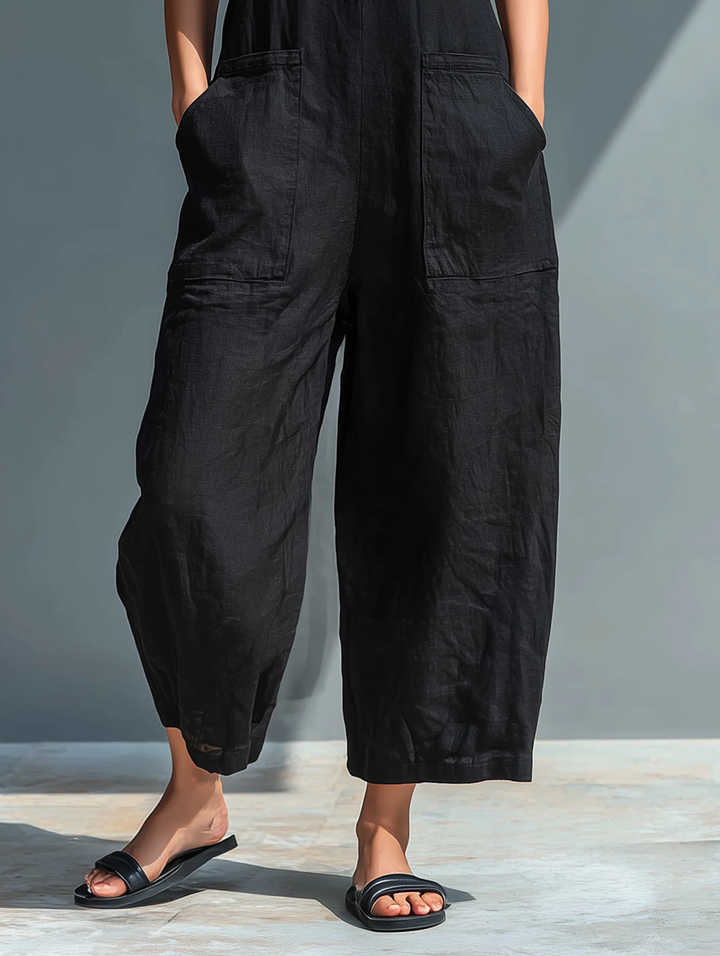 Women's versatile sleeveless loose jumpsuit. Comfortable one-piece for spring/summer, great as a casual travel outfit.