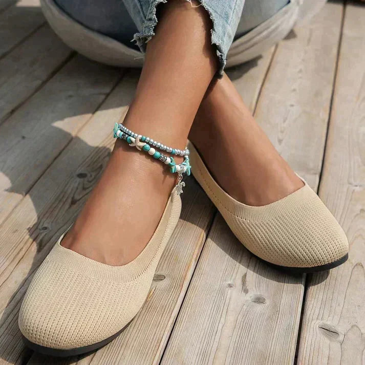 Classic black women's ballet flats, soft & comfortable slip-ons for walking and daily errands.