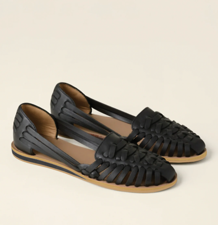 Women's comfortable slip-on sandals for effortless summer style. Lightweight, open-toe flat sandals for casual everyday wear.
