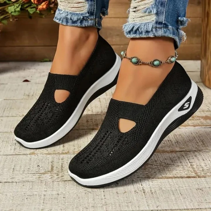 Stylish women's slip-on sneakers designed for breathable comfort and easy wear.