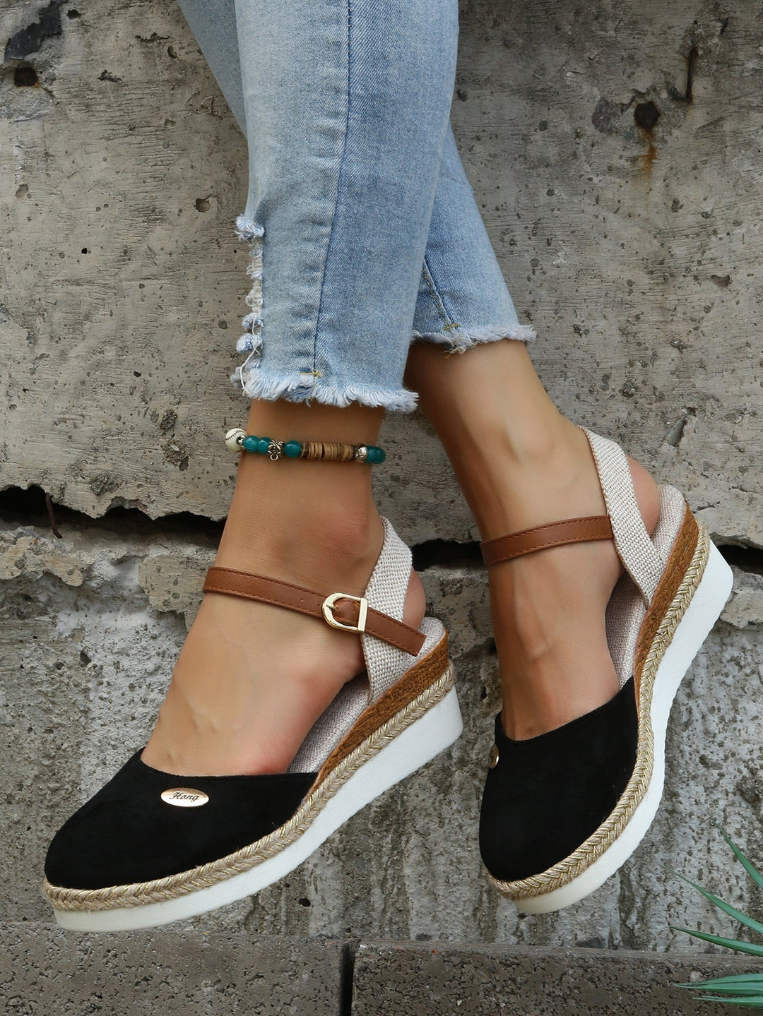Woman wearing comfortable slip-on Sofia espadrille flats, perfect for casual summer shoes & everyday comfort.