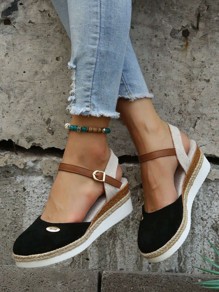 Woman wearing comfortable slip-on Sofia espadrille flats, perfect for casual summer shoes & everyday comfort.