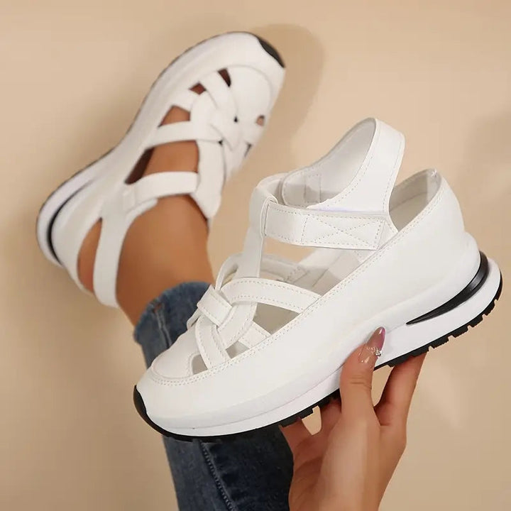 Stylish women's platform walking sandals with sporty cutouts & adjustable straps for all-day summer comfort.