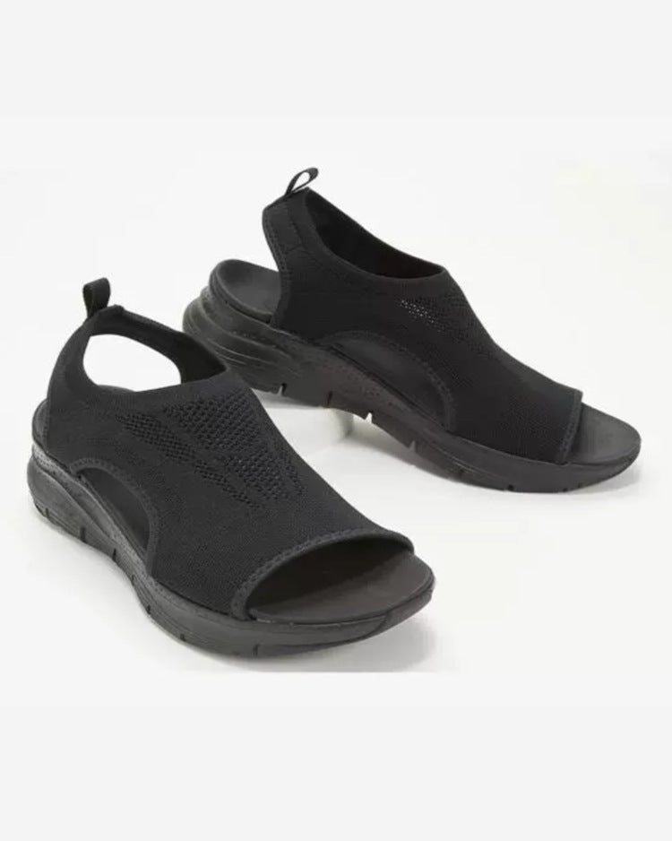 Casual open-toe flat sandals for women, offering comfort and style for spring and summer wear.