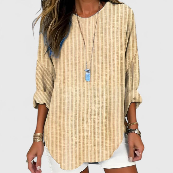 Women's comfortable striped long sleeve blouse with a crew neck, perfect for casual, everyday wear. Relaxed fit.