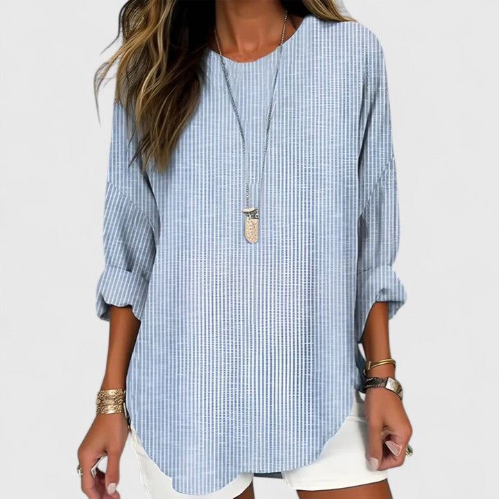 Stylish women's striped blouse. Versatile long sleeve crew neck top for all-season wear. Comfortable, relaxed fit.