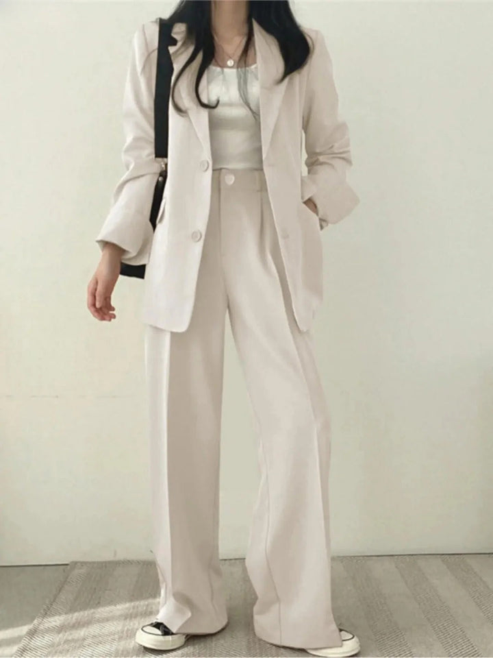 Versatile women's stretch two-piece pant suit, perfect for spring/fall business casual or smart everyday fashion.