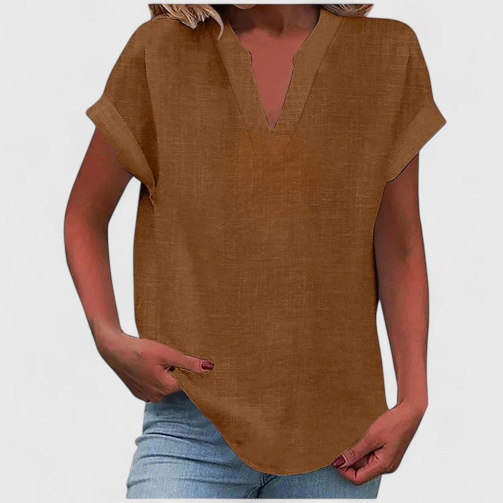 Women's comfortable V-neck short sleeve blouse in a soft fabric, perfect for everyday chic style.