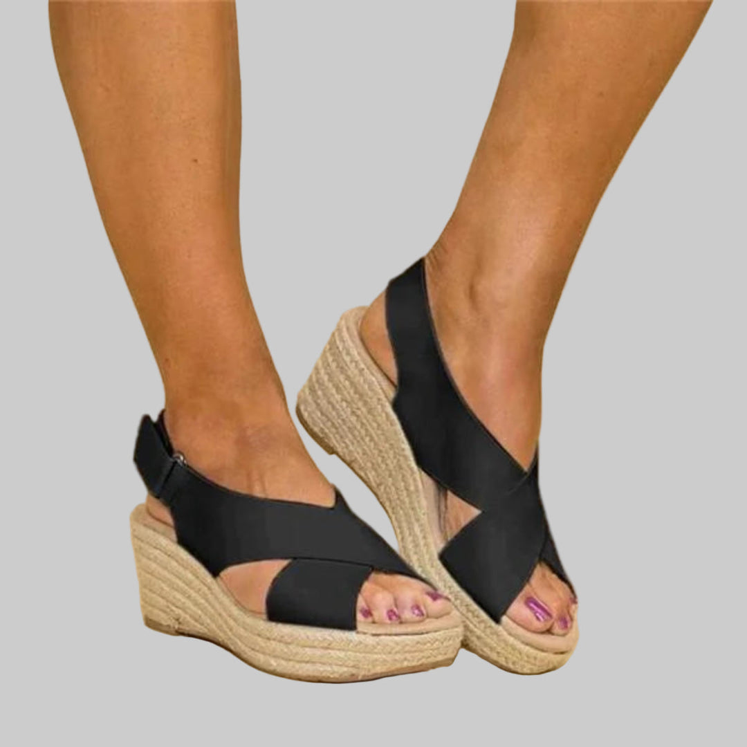 Women's comfortable wedge espadrilles, perfect for summer fashion. Stylish slip-on heeled sandals with beach style.