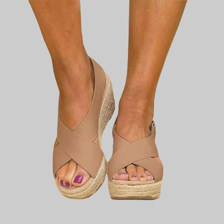 Chic women's wedge espadrille sandals, ideal for casual summer wear. Versatile heeled footwear, comfortable for all-day.