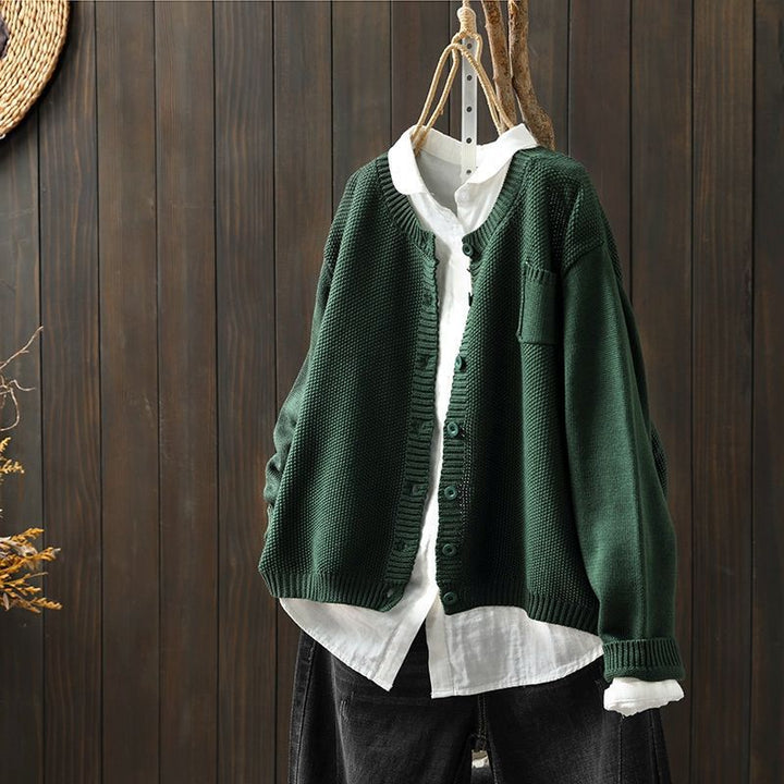 Soft knit cardigan for women, long sleeve, with decorative buttons, ideal for casual wear.