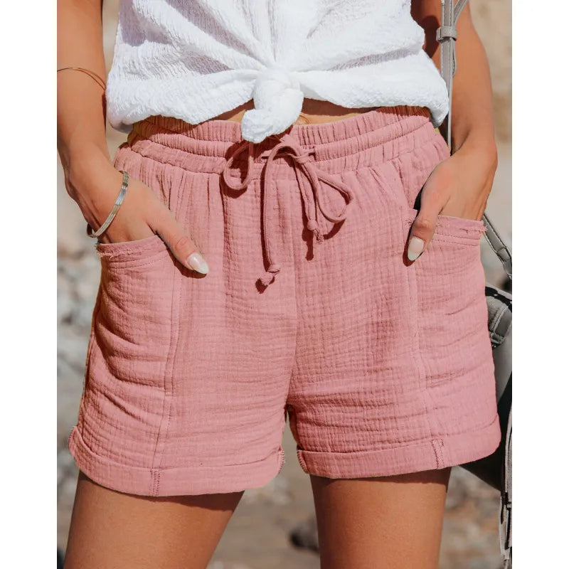 Women's comfy drawstring shorts with pockets. Casual pull-on style, perfect for summer lounge wear.