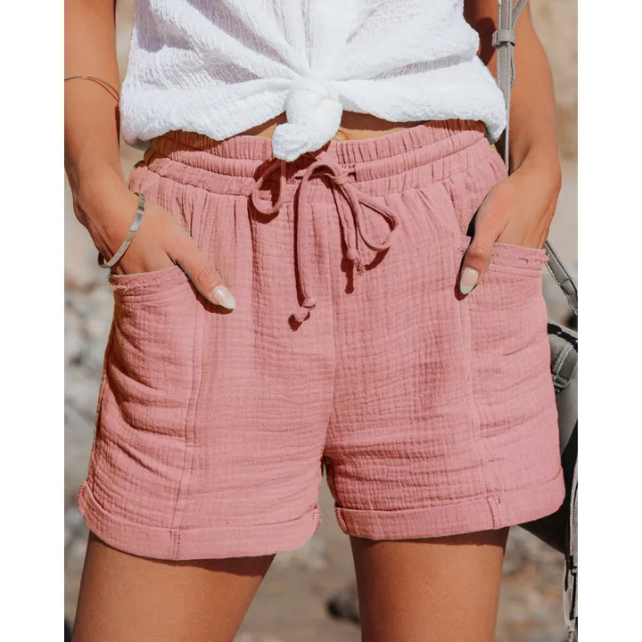 Women's comfy drawstring shorts with pockets. Casual pull-on style, perfect for summer lounge wear.