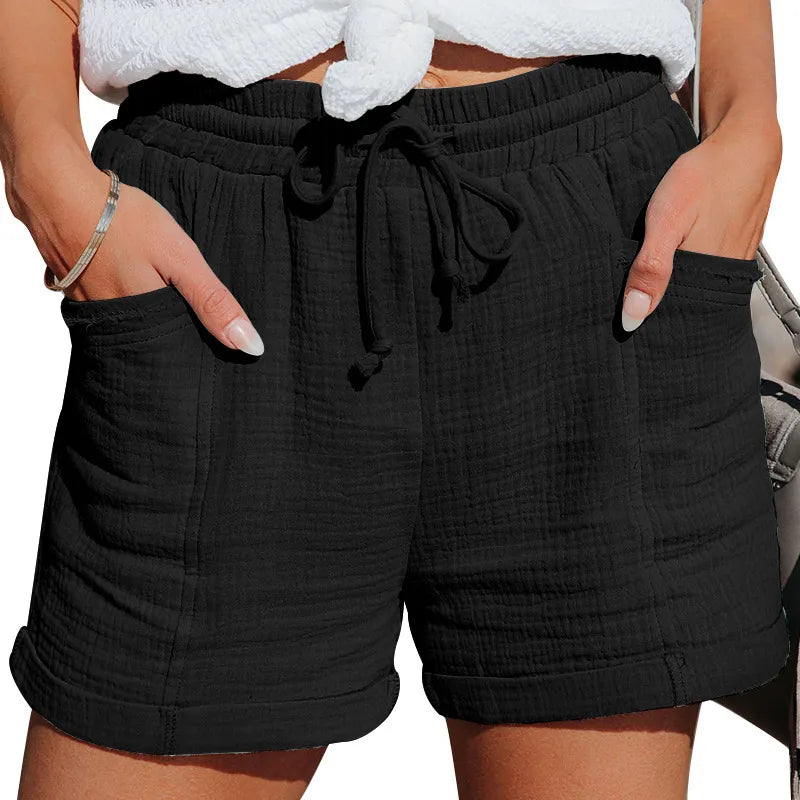 Stylish women's pull-on shorts featuring a drawstring waist & side pockets. Great for everyday casual wear.