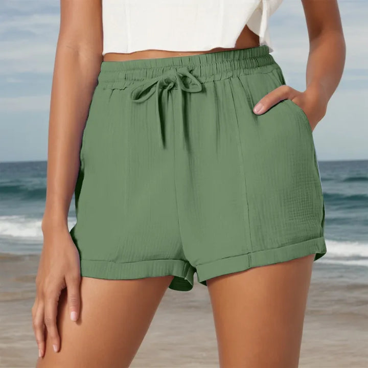 Casual women's summer shorts. Soft fabric, elasticated drawstring waist, and practical pockets for comfort.