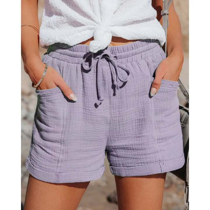 Versatile women's drawstring pocket shorts. Perfect for casual wear, summer activities, or lounging at home.