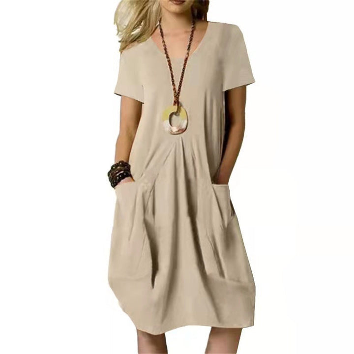 Chic women's summer knee-length swing dress with pockets & comfy short sleeves. Easy, casual everyday style.