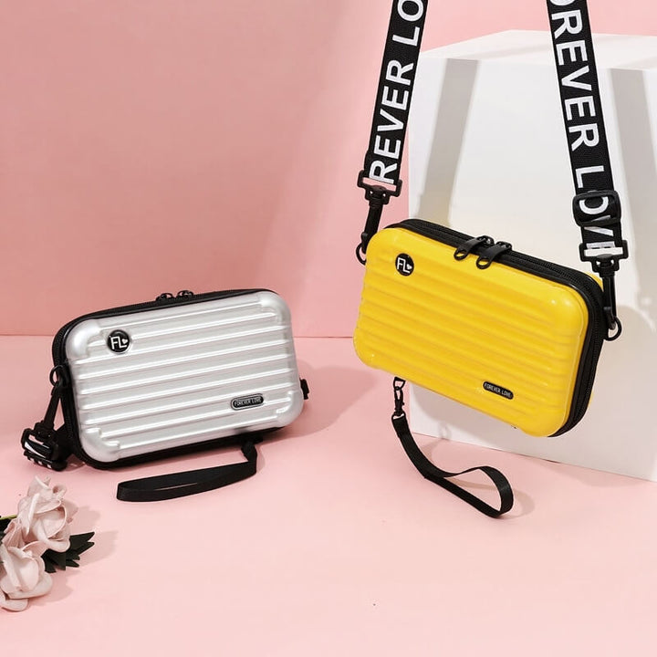 Women's travel-ready hard shell mini handbag, a durable crossbody for daily adventures and trips.