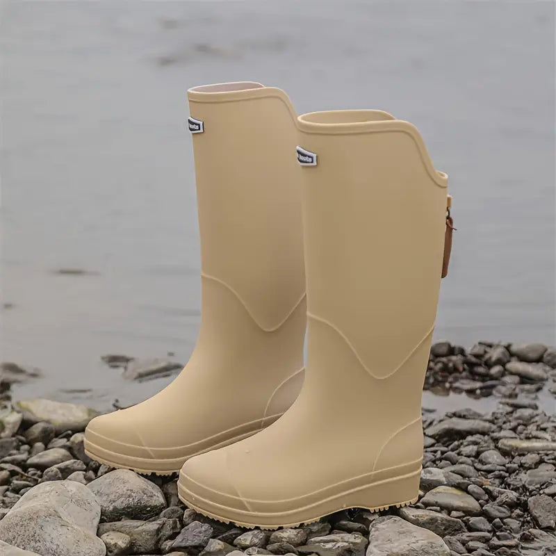 Comfortable women's Corina rain boots, waterproof PVC, featuring a reliable non-slip sole for outdoor wear.