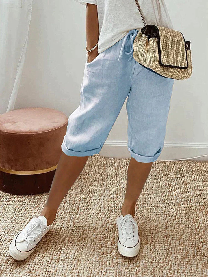 Women's versatile cotton capris with a practical drawstring waist & fashionable roll hem. Great for summer.