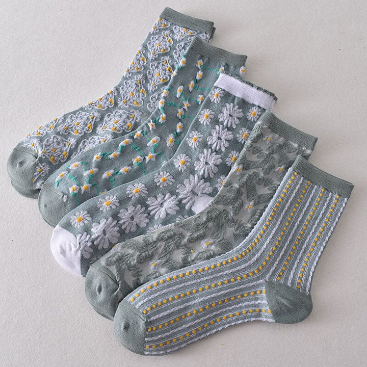 Women's casual floral cotton socks on a white background, emphasizing their detailed and colorful design
