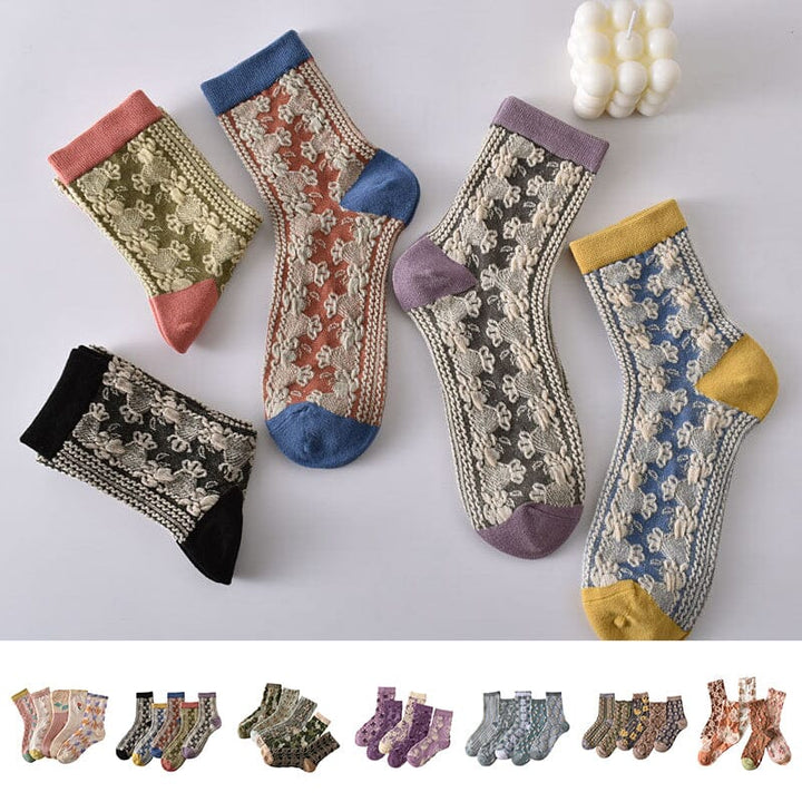 Close-up of women's floral cotton socks, showing intricate flower and leaf design on soft fabric