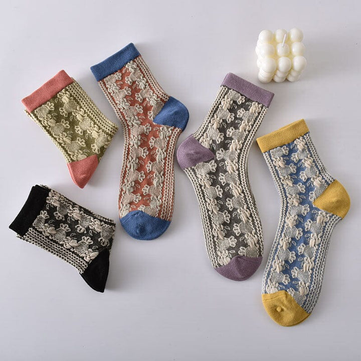 Model wearing women's breathable floral cotton socks, showcasing their ankle height and comfortable fit