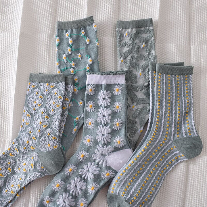 Detail view of the elastic cuff on women's floral patterned cotton socks, ensuring a snug fit