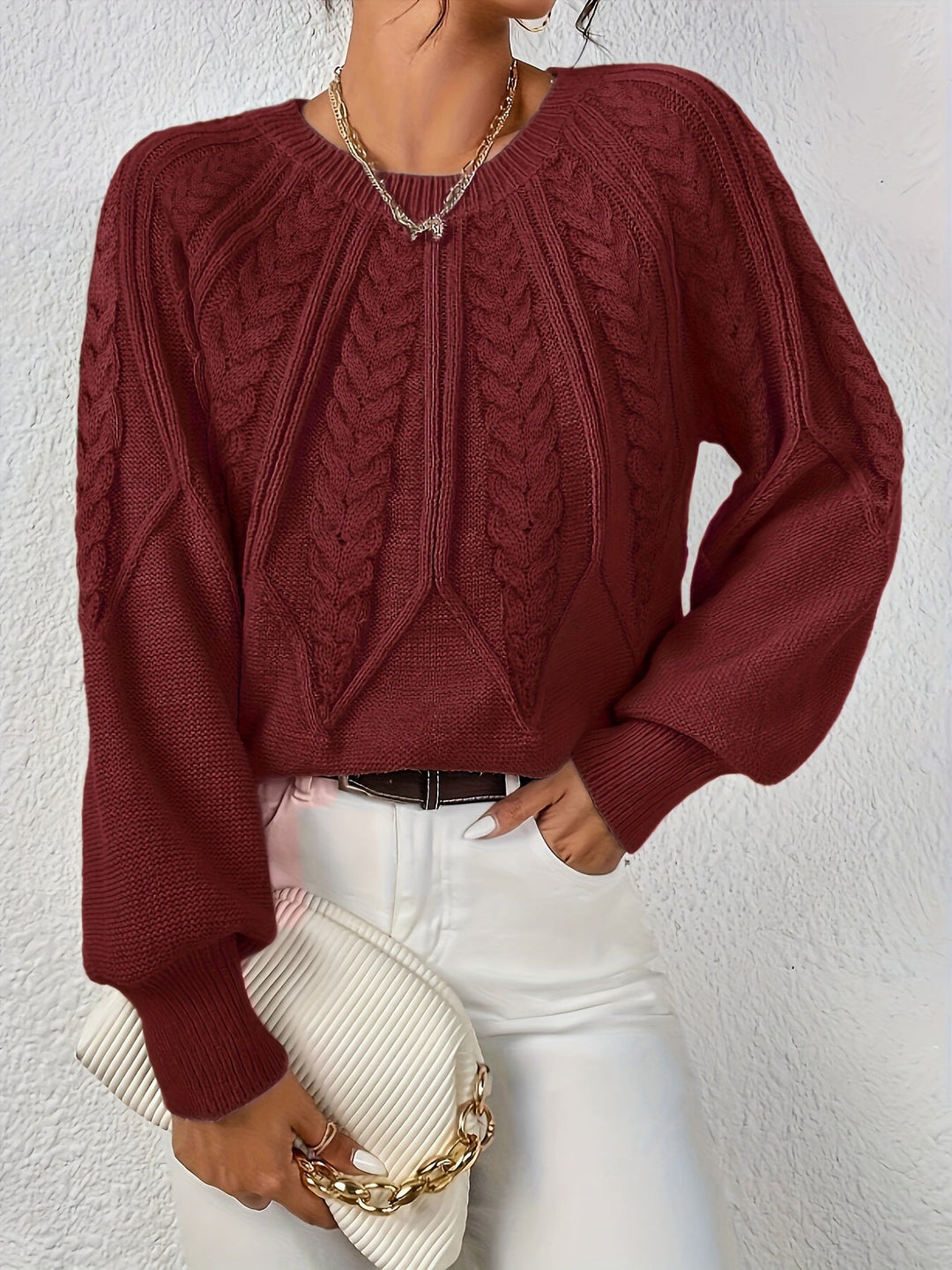 Everyday wear women's cable knit sweater, relaxed fit, with fashionable lantern sleeves.