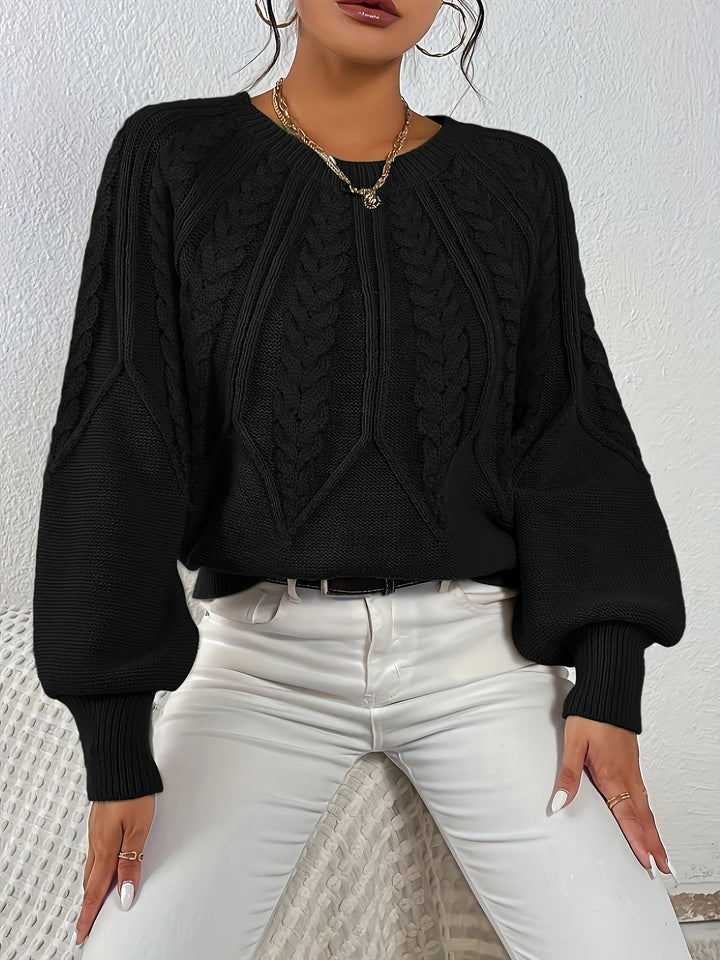 Cozy women's relaxed fit cable knit sweater, perfect for lounging or going out.