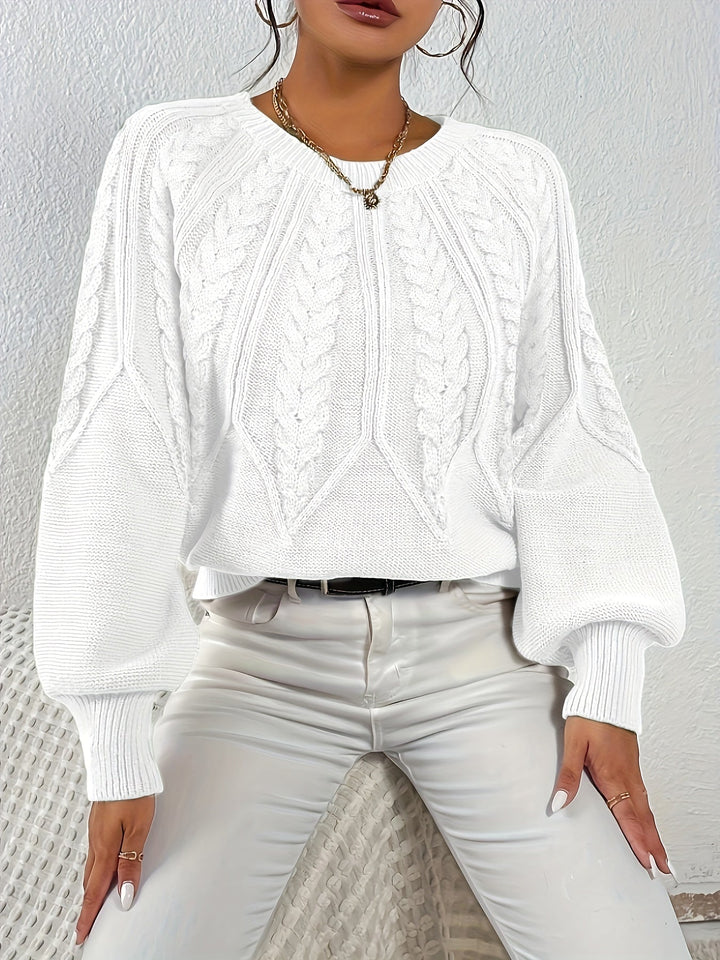 Women's relaxed fit cable knit sweater, cozy & fashionable, ideal for layering.