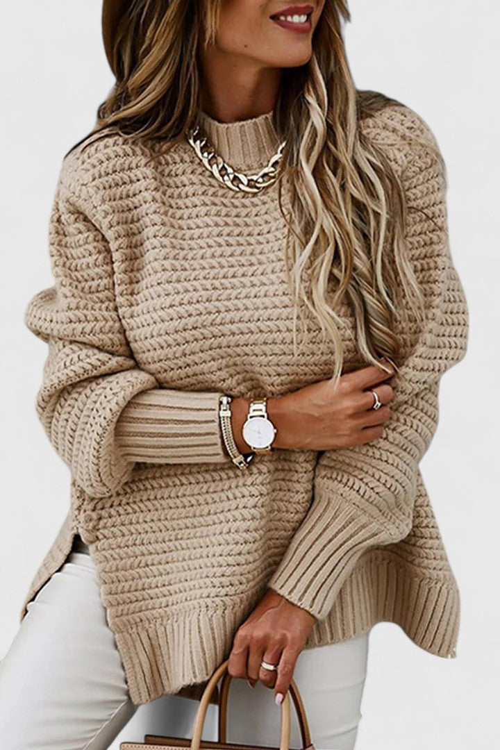 Oversized chunky knit women's pullover sweater with a cozy mock neck for ultimate winter warmth and comfort.
