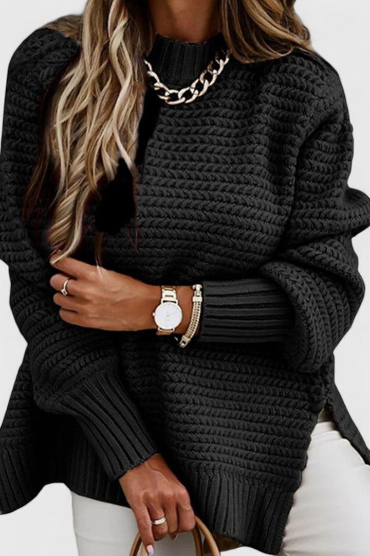 Warm women's chunky sweater featuring a cozy mock neck and ribbed design, ideal for winter casual wear.