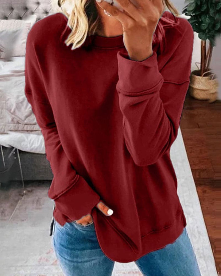 Comfortable women's classic pullover sweatshirt, a cozy and soft staple for everyday wear.