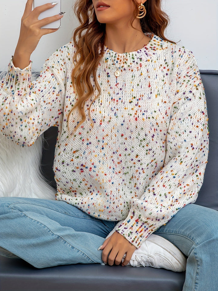 Women's cozy confetti print sweater with round neck, perfect for playful fall & winter fashion. Warm knitted pullover.