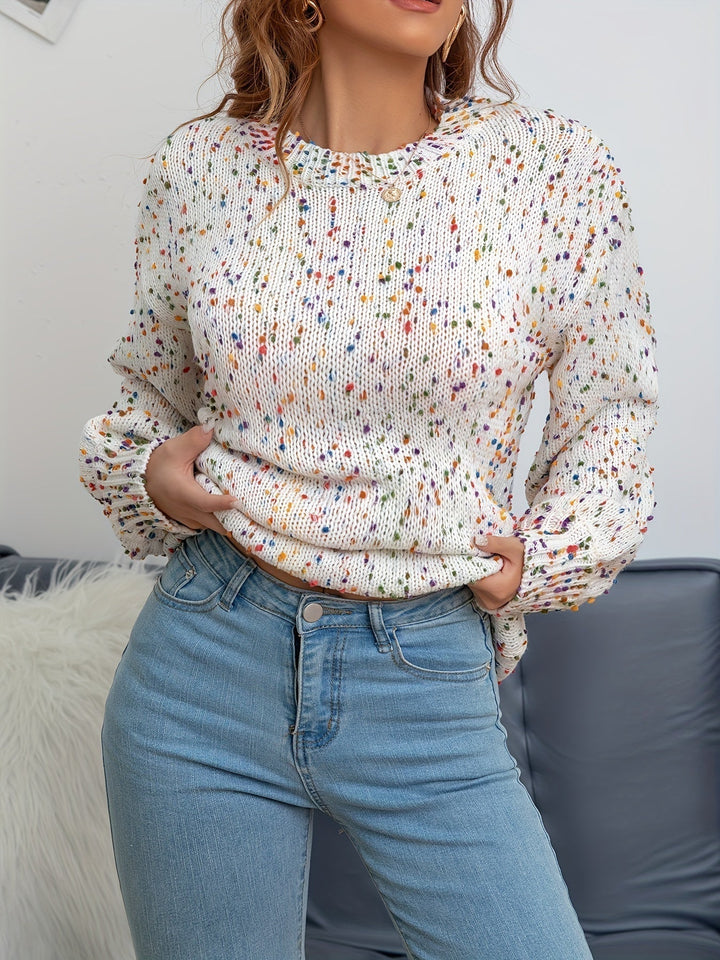 Playful women's knitted confetti print pullover, a cozy & warm round neck sweater for stylish fall and winter fashion.