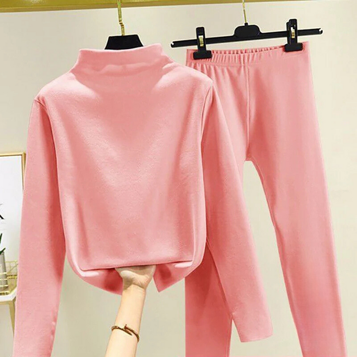 Women's cozy fleece pullover and trousers two-piece set for ultimate winter comfort and warmth.