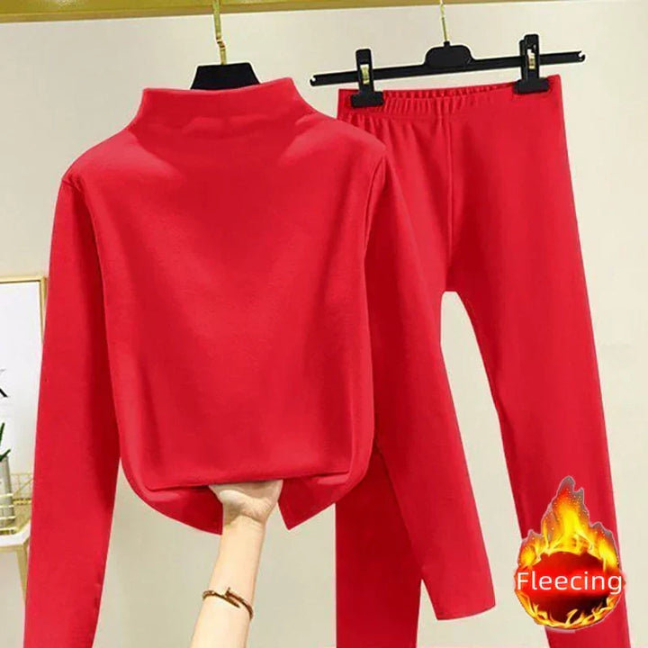 Complete women's autumn/winter outfit: a cozy fleece pullover and warm trousers set for ultimate comfort.