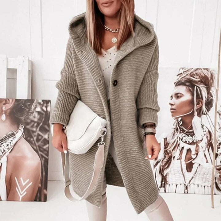 Soft women's open front hooded cardigan in a warm winter knit, ideal for casual wear.