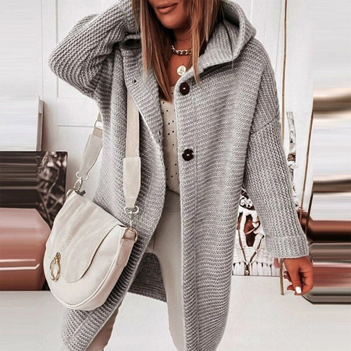 Cozy women's hooded cardigan, long sleeve design, perfect for comfortable winter layering.